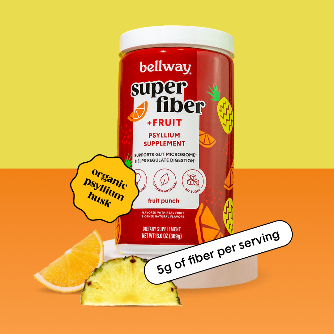 Bellway Super Fiber + Fruit fruit punch product image on an orange and yellow background with an orange slice and a pineapple slice. Text callouts read "organic psyllium husk" and "5g of fiber per serving."