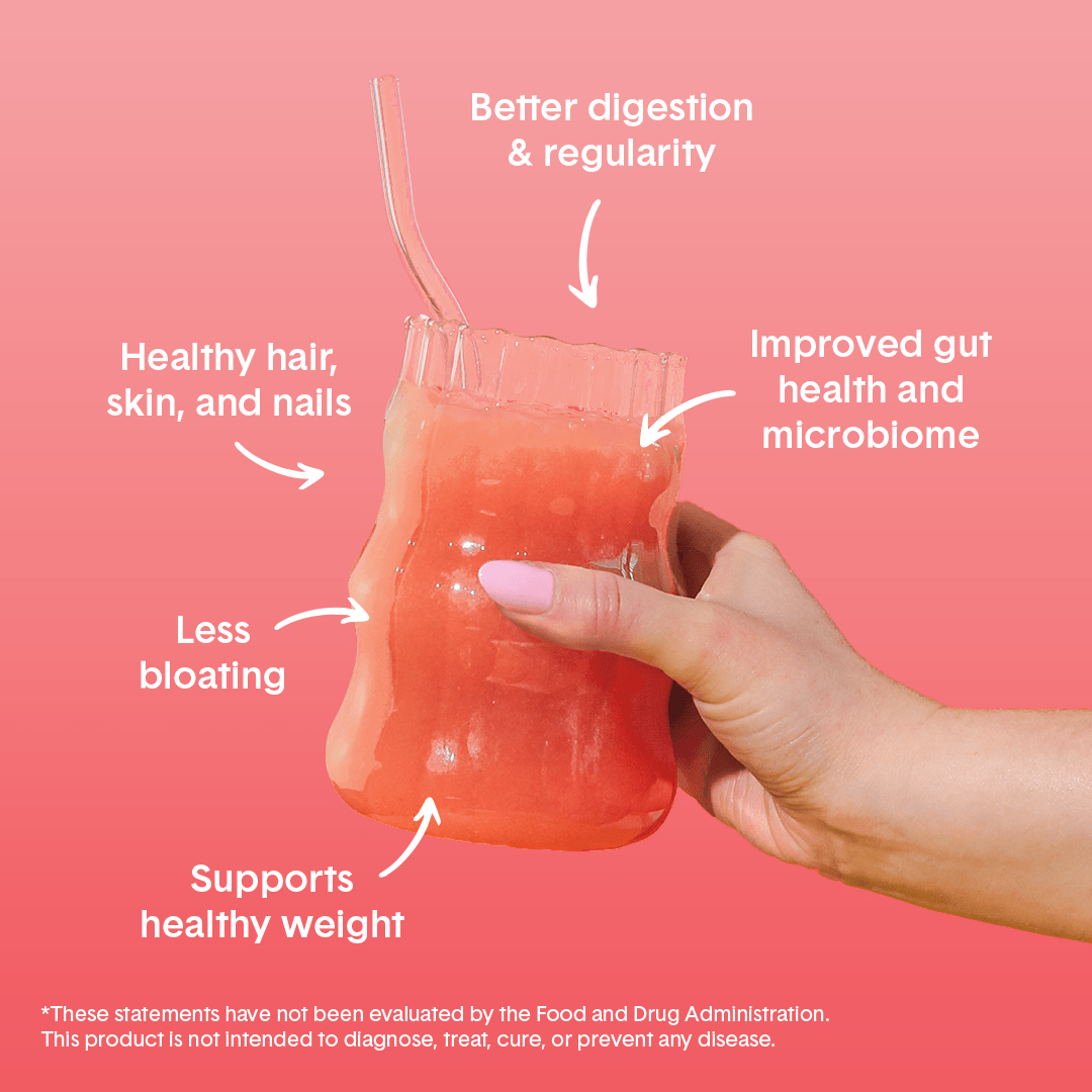 Hand holding Bellway Super Fiber supplement drink in a clear glass on a pink background with surrounding text that reads: "Supports healthy weight, less bloating, healthy hair, skin, and nails, better digestion & regularity, improved gut health and microbiome."